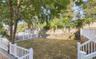 View of fenced backyard