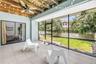 Fully Screened Back Porch accesses the fenced yard for Recreation and Pets.