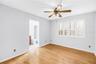 Upstairs 2nd Suite. Light hardwood flooring, nice view, plantation shutters