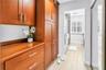 Primary en Suite Bath with Coffee Service area and beautiful Custom Cabinetry.  Great Storage!