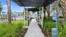 Paved walkway provide easy access to community amenities throughout this welcoming, dog-friendly neighborhood.