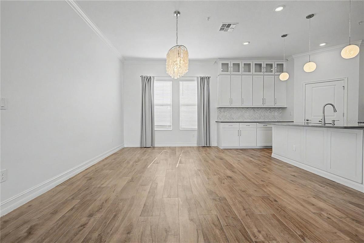 Second-level dining area with an open, inviting layout.