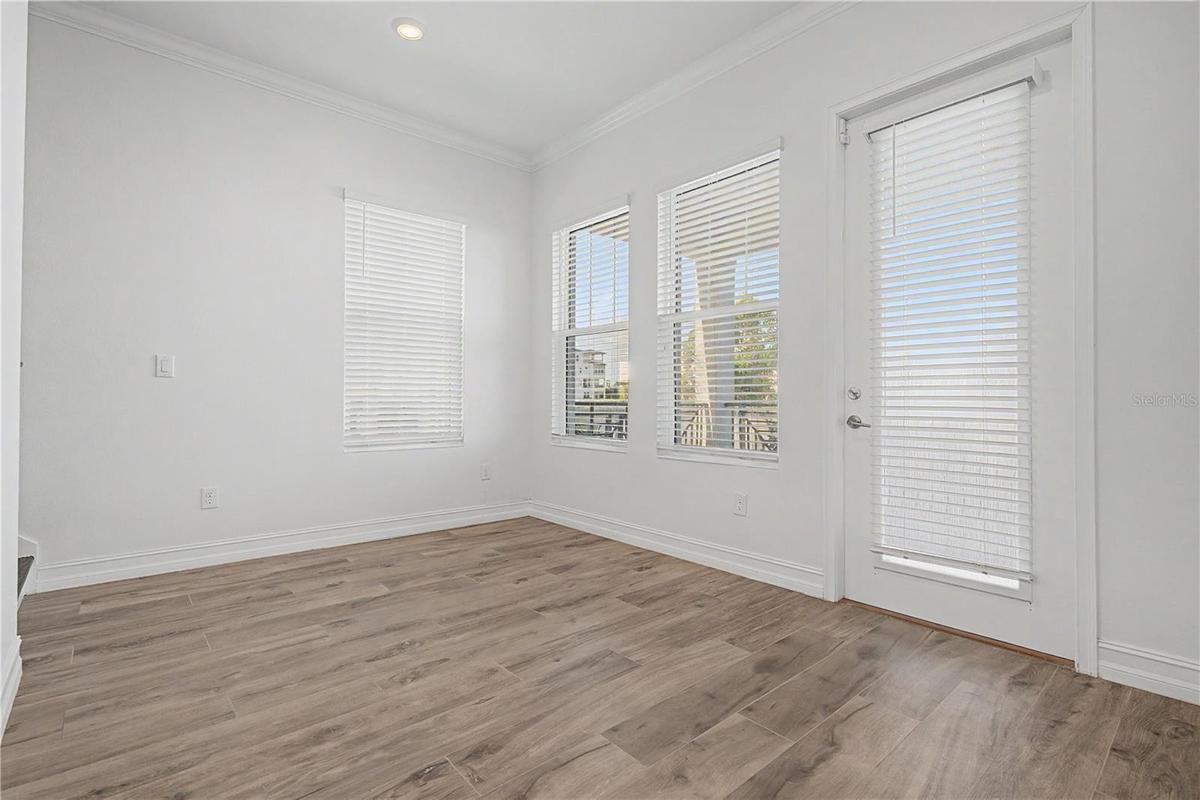 First-level living area with direct access to the outdoor patio and beautiful waterfront views.
