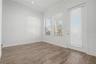 First-level living area with direct access to the outdoor patio and beautiful waterfront views.