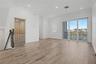 Second-level living area-elevator-doors to second floor balcony