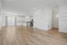 Second-level view from the living area, highlighting the open-concept layout.