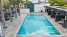 Inviting community pool, perfect for relaxing and unwinding in your downtime.