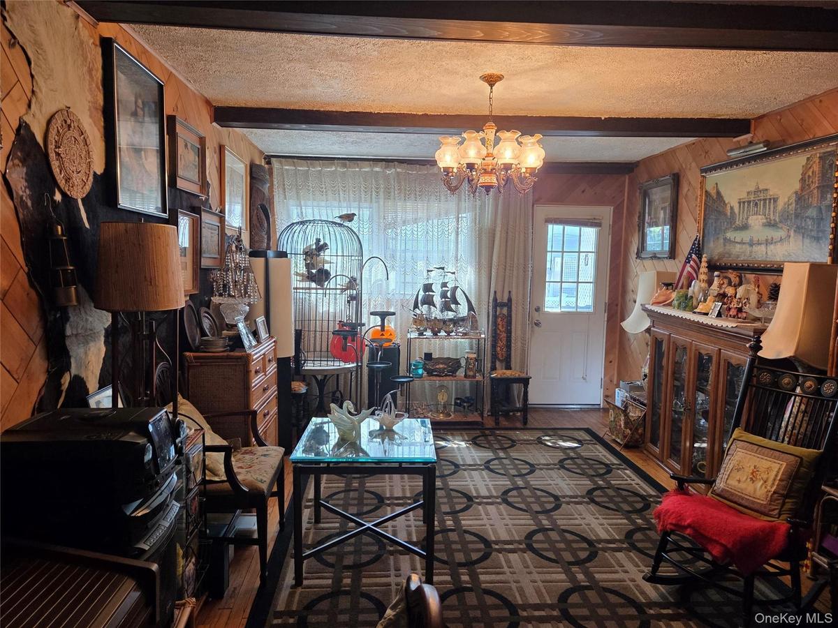 Den with access to the Terrace and Garage