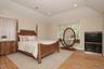 Primary Bedroom with vaulted ceiling