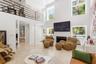 Two story 24'ceiling space with fireplace