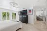French doors lead to private balcony