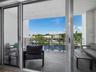 Impact sliders open to private balcony