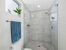 Tile floors in both bathrooms