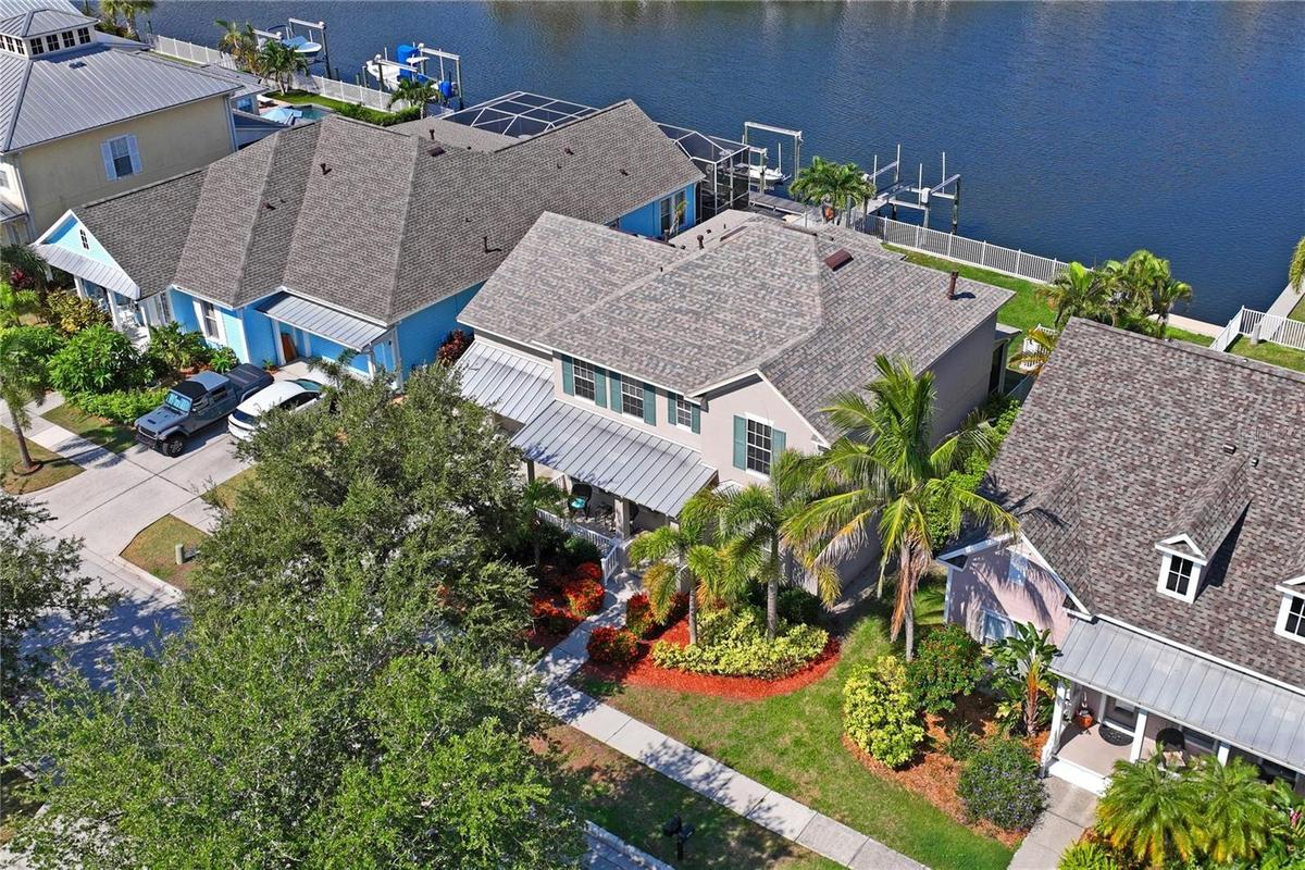 Exterior Waterfront Home Backyard Facing West