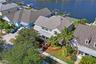 Exterior Waterfront Home Backyard Facing West