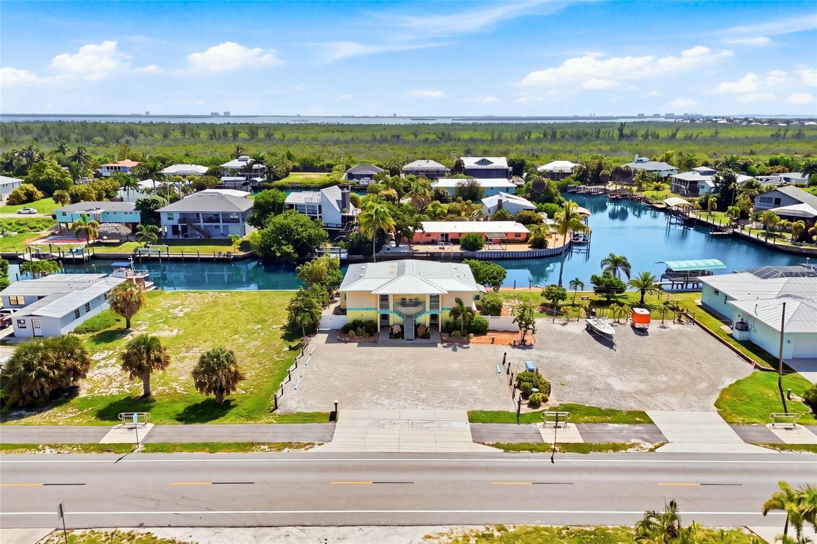 Welcome to Golden Palms Resort, a beautifully updated eight-unit waterfront retreat offering the perfect combination of investment opportunity and lai