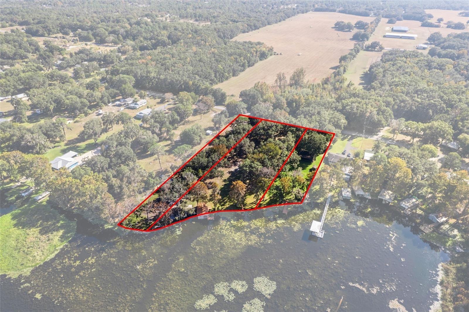 3 ACRES / 3 PARCELS/ 4 LOTS and 320' Shoreline!