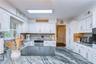 Durable granite surfaces provide generous preparation space
