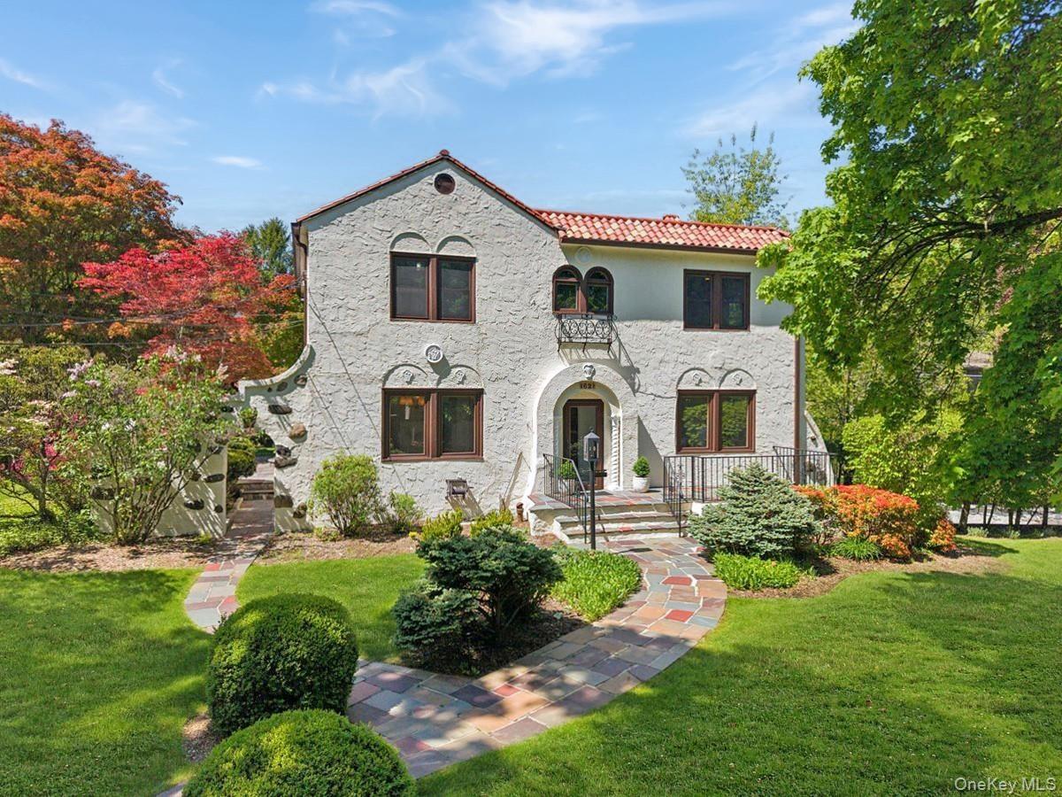 With timeless Mediterranean architecture, beautifully scaled rooms, and seamless indoor-outdoor living, this special Bonnie Crest residence offers a l