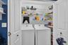 Laundry closet in the kitchen area