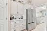 New cabinets, tops and appliances