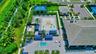 Community amenity space featuring a clubhouse, water play area, and outdoor pool