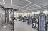 Fitness center featuring extensive exercise equipment