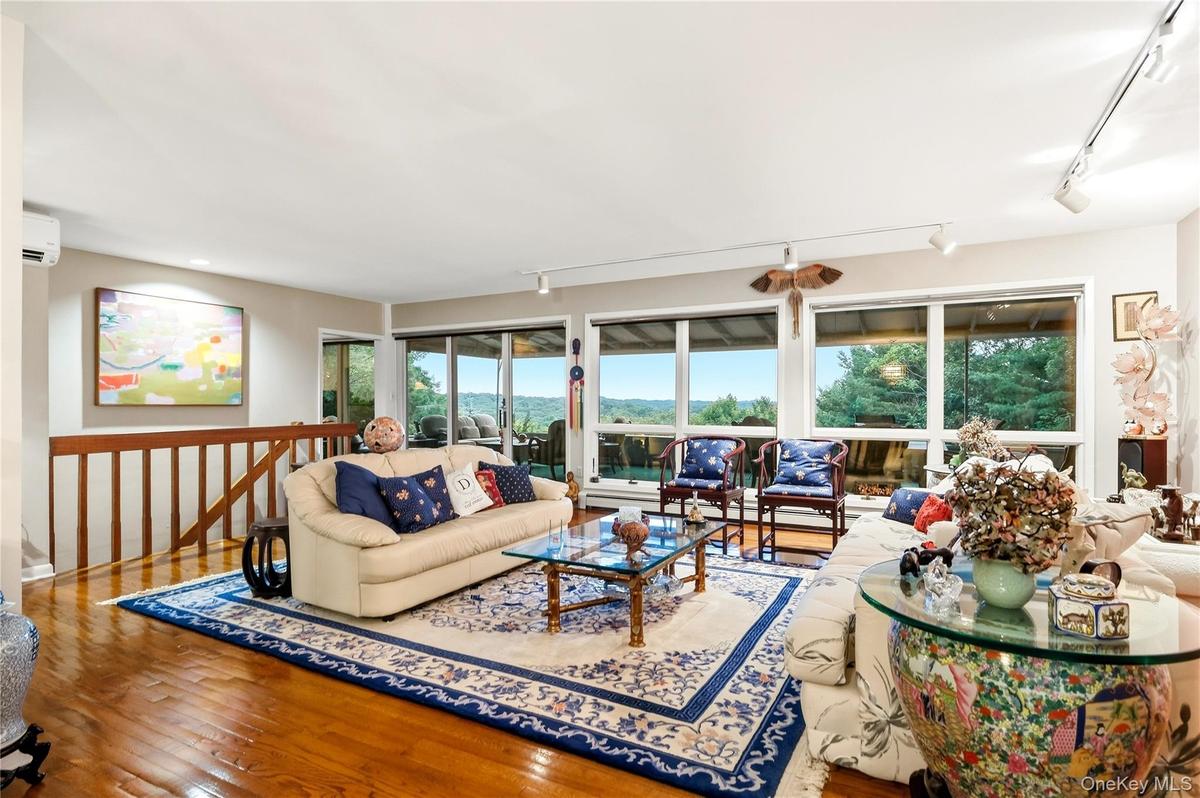 Living Room with windows out to balcony