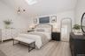 Virtually staged 2nd bedroom loft used as a 3rd bedroom.