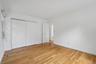 Primary  bedroom with double slider closet