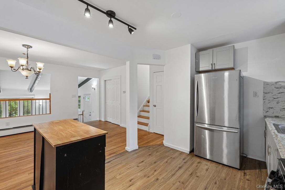 Dining room with view of kitchen and living room