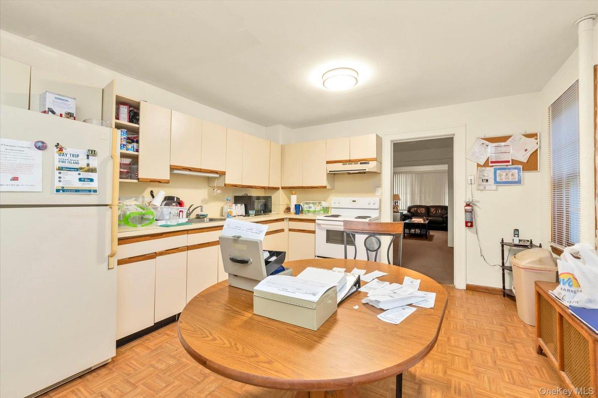 1st floor; Large Eat-in-kitchen with Electric Stove & Refrigerator