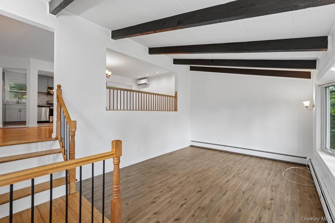 Family room with stairs to living room