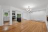 Living room with view of dining room