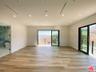 spacious primary bedroom suite