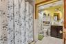 Primary Bathroom also has an ADA-compliant shower as well as bathtub.