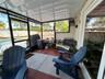 Oversized patio with sliders from the family room