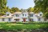 Set on a 1-acre desirable culdesac block offering waterviews of the LI Sound