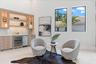 Custom bar with ice maker and wine refrigerator in living room