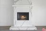 Marble wood burning fireplace