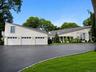 Fully renovated Residence featuring 3-Car Garage and Gated Circular Driveway
