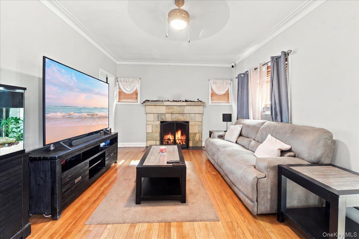 Living Room w/ Fireplace - Virtually Enhanced