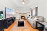 Living Room w/ Fireplace - Virtually Enhanced
