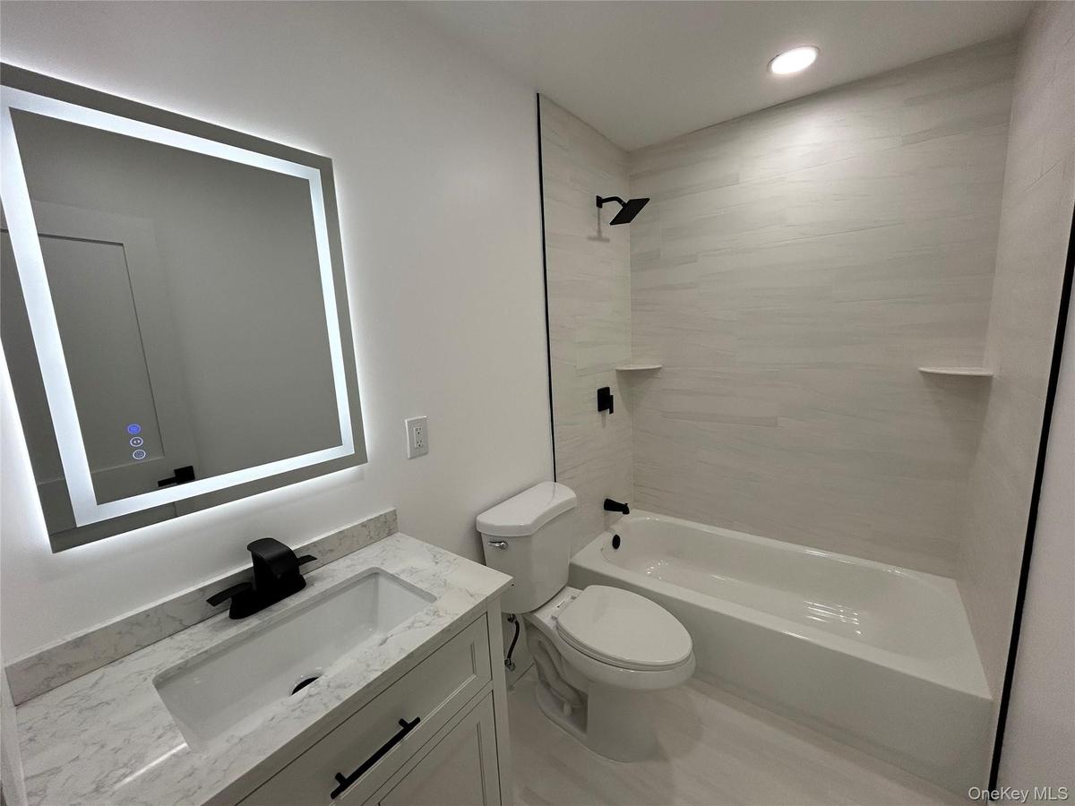 Tiled Shower and flooring.