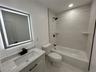 Tiled Shower and flooring.
