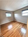 Bedroom 2 w Refinished Floor