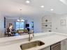 Kitchen Overlooking Dining area and Living Room