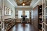Office with a Murphy Bed and beautiful wood inlay ceiling.