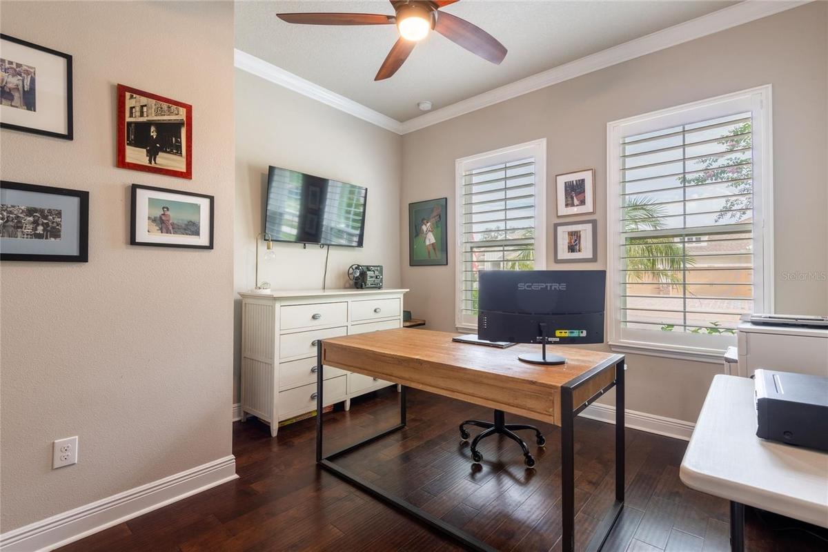 This home has Plantation Shutters and Crown Molding throughout the home.
