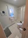 Bathroom with tub and separate shower.